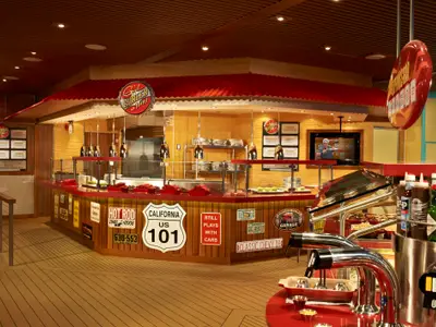 Ein hell beleuchtetes Burger-Buffet im Retro-Diner-Stil. Rote Theken, Holzverkleidung mit Nummernschildern und ein großer Soßenbereich sind sichtbar.