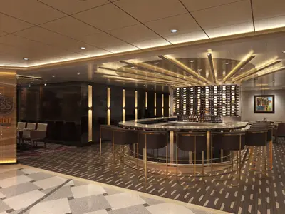 Innenansicht eines luxuriösen Steakhouse-Restaurants auf der Carnival Celebration. Eine runde Bar mit Barhockern, dahinter eine Weinwand. Links das Schild '555 Fahrenheit Steakhouse'. Im Hintergrund Tische und Stühle in gedämpftem Licht. Elegante Beleuchtung und moderne Einrichtung.