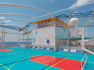 Multifunktions-Sportdeck auf der Carnival Celebration mit blau-rotem Platz, Basketballkörben, Sitzbänken und Hochseilgarten darüber. Im Hintergrund das offene Meer.