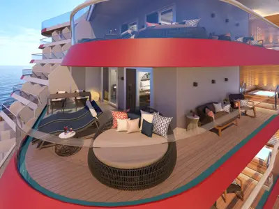 Luxuriöse, mehrstöckige Balkonsuite auf der Carnival Celebration mit Meerblick. Die Suite verfügt über eine Liegeinsel, Sonnenliegen, Esstisch und Whirlpool auf der oberen Ebene.
