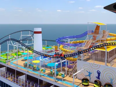 Oberdeck der Carnival Jubilee mit Achterbahn, bunten Wasserrutschen und Minigolfanlage. Der weite Ozean ist unter blauem Himmel sichtbar. Ohne Personen.