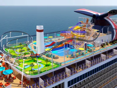Vogelperspektive auf ein lebhaftes Sonnendeck der Carnival Jubilee. Eine Achterbahn schlängelt sich über eine Minigolfanlage und mehrere bunte Wasserrutschen. Das Meer ist im Hintergrund sichtbar.