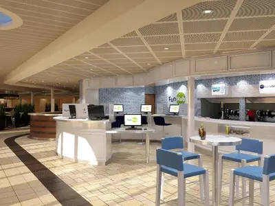 Ein großes, modernes Interieur auf der Carnival Sunshine mit einer Internet-Cafe-Zone namens 'Fun Hub' links und einer Bar mit 'Shake Spot' und 'Javablue' Beschilderung rechts, blauen Hockern und Tischen in der Mitte.