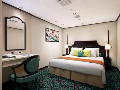 Helle Innenkabine der Carnival Vista mit einem Doppelbett, zwei Nachttischen mit Lampen und einem Schreibtisch mit Spiegel und Telefon. Der Boden ist mit einem gemusterten Teppich in Türkis und Dunkelrot ausgelegt. Gelbe und türkise Kissen schmücken das Bett.