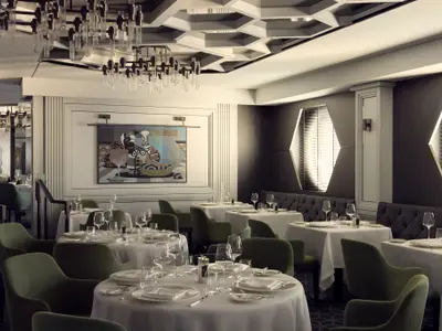 Fein eingedeckte Tische mit grünen Sesseln im eleganten Restaurant Fil Rouge an Bord der Explora II.