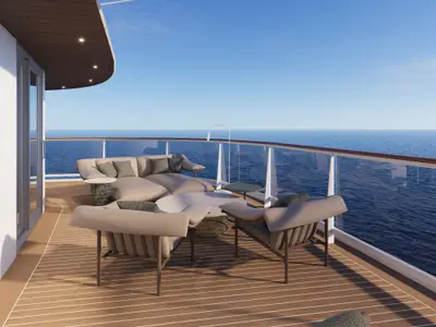 Großzügiger Balkon der Owner's Residence an Bord der Explora III mit stilvollen Loungemöbeln und freiem Blick auf das blaue Meer.
