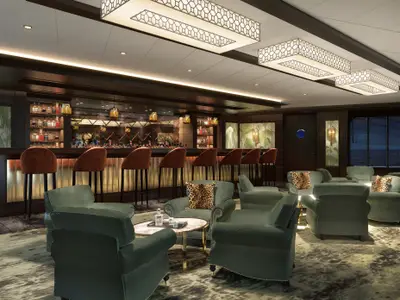 A stylish whiskey bar, Maltings, on board the Norwegian Encore. Features a long bar with stools and a lounge area with dark green armchairs and leopard print cushions.
