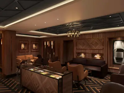 Die luxuriöse Humidor Cigar Lounge der Norwegian Luna. Dunkle Holzvertäfelung, bequeme Ledersofas und Sessel, sowie dekorative Nischen und ein Kronleuchter prägen das exklusive Ambiente.