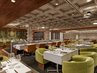 Modernes Restaurant an Bord der Norwegian Luna. Gedeckte Tische mit Gläsern, grünen Sesseln und braunen Stühlen. Grüne Marmorwand, kassettierte Decke.