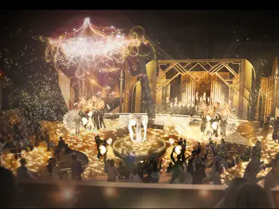Opulente Bühnenshow auf der Anthem of the Seas. Goldene Art-déco-Bühne mit Tänzern, Darstellern und Publikum, umgeben von funkelnden Lichtern und Konfetti.
