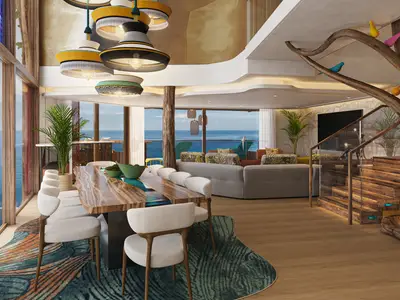 Geräumige, luxuriöse Suite mit Panorama-Meerblick. Großer Esstisch, bequeme Sitzgelegenheiten und eine beeindruckende Baumhaus-Treppe mit bunten Vögeln. Modernes Design mit viel Holz und Licht.