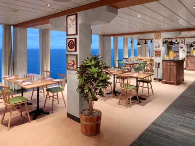 Restaurant auf der Wonder of the Seas mit Meerblick. Rustikale Einrichtung: Holztische, Stühle mit grünen Kissen, Topfpflanze. Fenster, Servicestationen im Hintergrund.